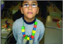 An example of a pattern on a student wearing beaded necklace, with repeated patterns.