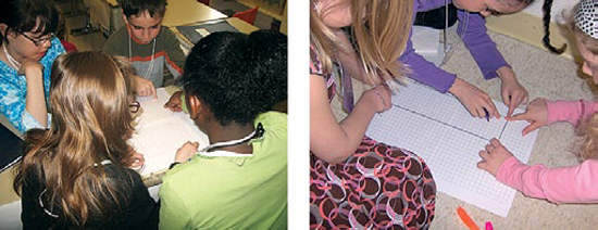 Classroom situation. Two adults circulating and handing out objects to students.